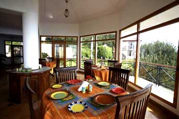 dining room of Banjara Orchard Retreat, Thanedar